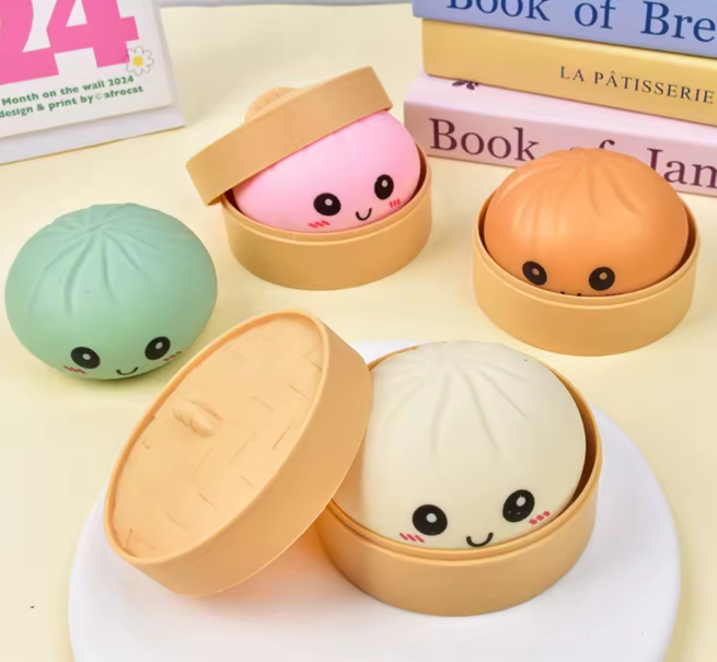 Four slow-rise squishy dumplings in steamers